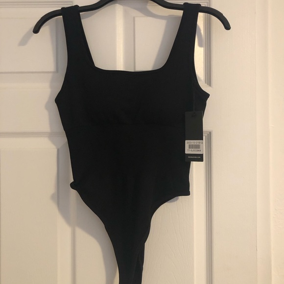New black body suit perfect for the summertime. Size medium - Picture 10 of 13